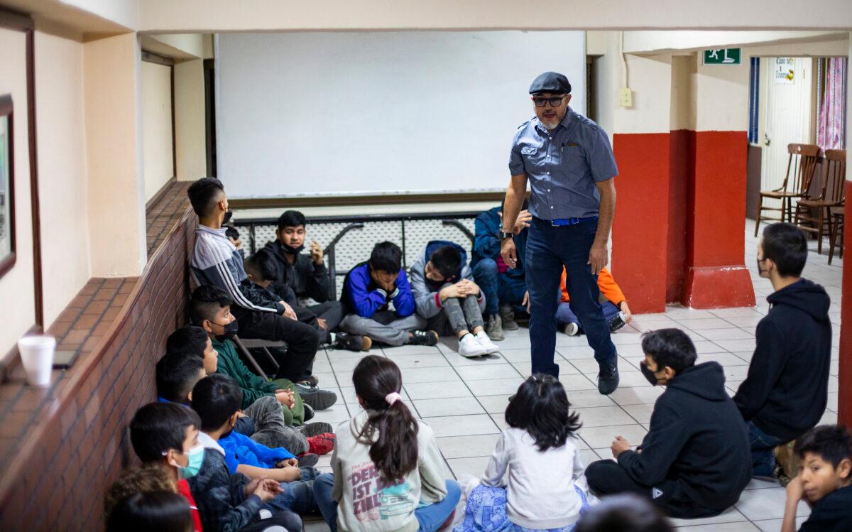 Obed Quiñonez teaches local children in his Kids Club ministry at Iglesia Cristiana Bethel in Tijuana, Mexico, on Feb. 5, 2022. (John Fredricks/The Epoch Times)