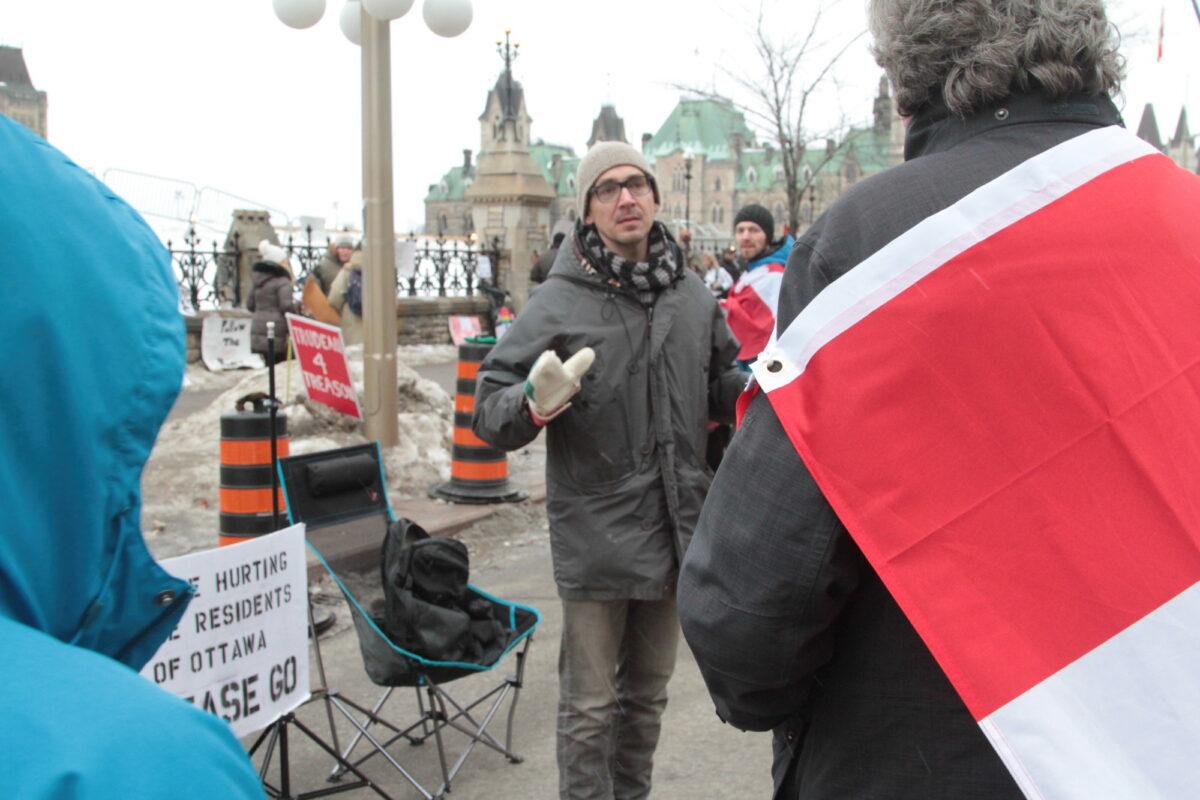 Local resident Bobby Smith asked the protesters to move on, in Ottawa, Canada, on Feb. 11, 2022. (Richard Moore/The Epoch Times)