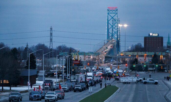 Protesters Remain at Canada-US Border Crossing Bridge Despite Court Injunction