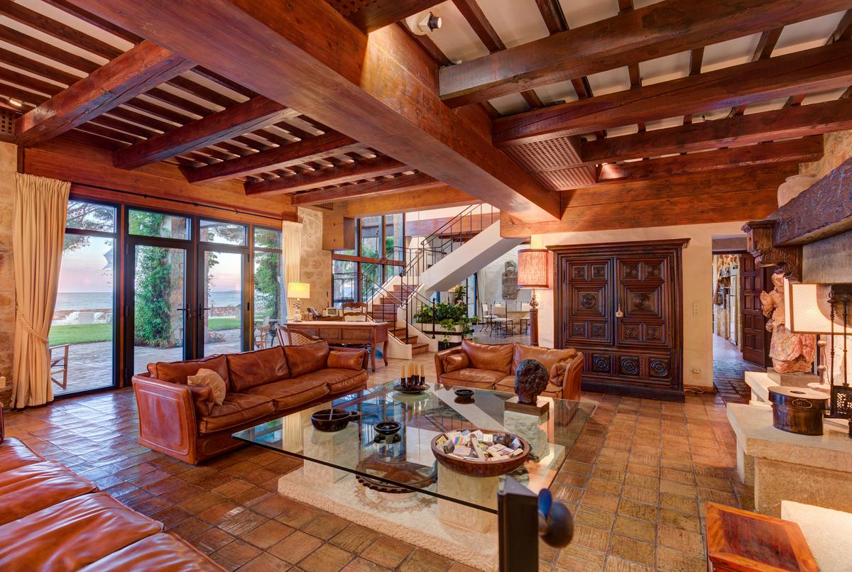 The use of massive wood beams, warm terracotta, and an interesting blend of the grandiose and the functional also make this property unique. (Courtesy of Carlton International)