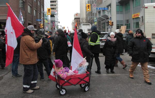 Children at the protest in Ottawa, Canada, on Feb. 12, 2022. (Richard Moore/The Epoch Times)