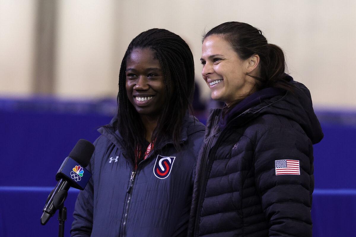 Erin Jackson (L) and Brittany Bowe speak to the media during the 2022 U.S. Speed Skating Long Track Olympic Trials at Pettit National Ice Center in Milwaukee, Wis., on Jan. 9, 2022. (Stacy Revere/Getty Images)