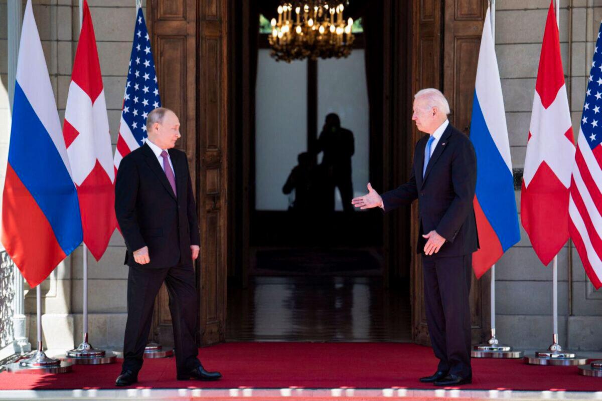 President Joe Biden prepares to shake hands with Russian President Vladimir Putin prior to the U.S.–Russia summit at the Villa La Grange in Geneva on June 16, 2021. (Brendan Smialowski/AFP)