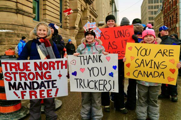 Children participate in the Freedom Convoy protest against COVID-19 mandates and restrictions in Ottawa on Feb. 9, 2022. (Jonathan Ren/The Epoch Times)