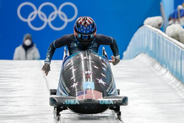 Elana Meyers Taylor of the United States drives during the women's monobob heat 3 at the 2022 Winter Olympics in the Yanqing district of Beijing, on Feb. 14, 2022. (Mark Schiefelbein/AP Photo)