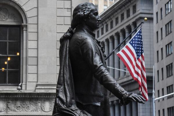 A statue of George Washington is seen near the New York Stock Exchange building along Wall Street on August 1, 2018 in New York City. (Stephanie Keith/Getty Images)