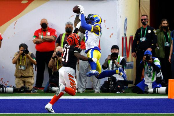Odell Beckham Jr. #3 of the Los Angeles Rams makes a catch over Mike Hilton #21 of the Cincinnati Bengals for a touchdown in the first quarter during Super Bowl LVI at SoFi Stadium, in Inglewood, Calif., on February 13, 2022. (Ronald Martinez/Getty Images)