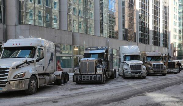 Protest trucks have been parked in central Ottawa streets for more than two weeks by Feb. 14, 2022. (Richard Moore/The Epoch Times)