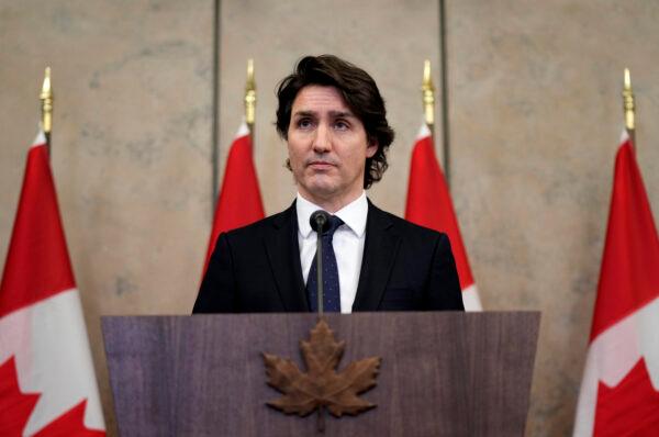 Prime Minister Justin Trudeau speaks to reporters about the ongoing protest in Ottawa and blockades at various Canada-U.S. borders, on Parliament Hill in Ottawa on Feb. 11, 2022. (Justin Tang/The Canadian Press)