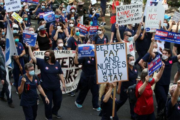 Nurses and members of the health sector rally outside Parliament House in Sydney, Australia, on Feb. 15, 2022. (Lisa Maree Williams/Getty Images)