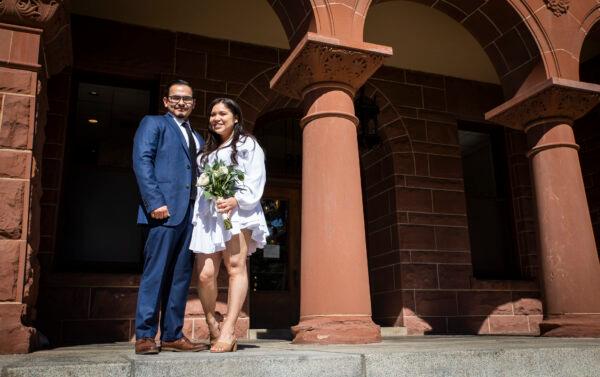 Ricardo and Yasmine Orellana arrange for Valentine's Day courthouse wedding services at the Old Orange County Courthouse in Santa Ana, Calif., on Feb. 14, 2022. (John Fredricks/The Epoch Times)