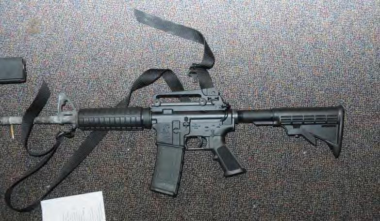 A Bushmaster rifle lies on the floor inside Sandy Hook Elementary School in Newton, Conn., following a Dec. 14, 2012, shooting. (Connecticut State Police via Getty Images)