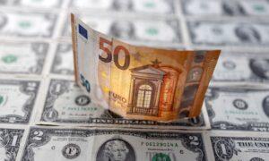 Euro Eases Versus Dollar as Traders Await Further Clues on Fed, ECB Path