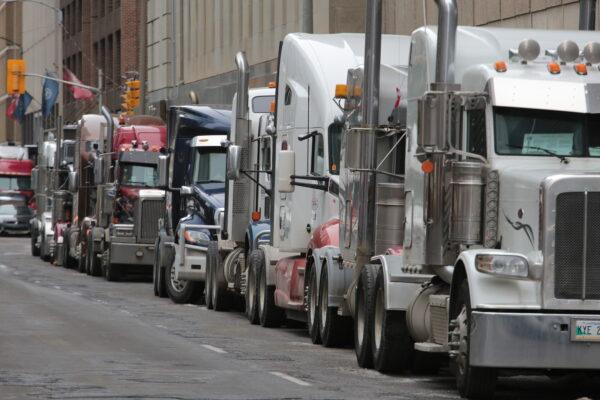  Protest trucks have been parked in central Ottawa streets for more than two weeks by Feb. 14, 2022. Image was taken on Feb.11. (Richard Moore/The Epoch Times)