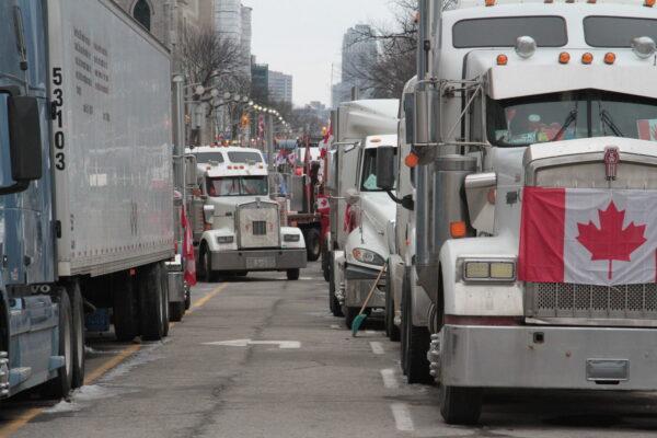  Protest trucks have been parked in central Ottawa streets for more than two weeks by Feb. 14, 2022. This image was taken on Feb. 11. (Richard Moore/The Epoch Times)
