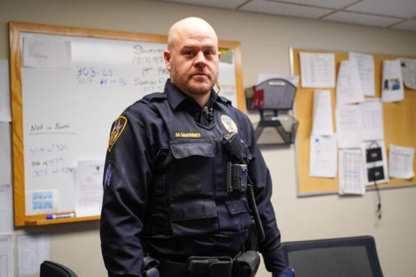 Sergeant Matthew McKinney in his office at Urbana Police Department in Urbana, Ill., on Feb. 10, 2022. (Cara Ding/The Epoch Times)