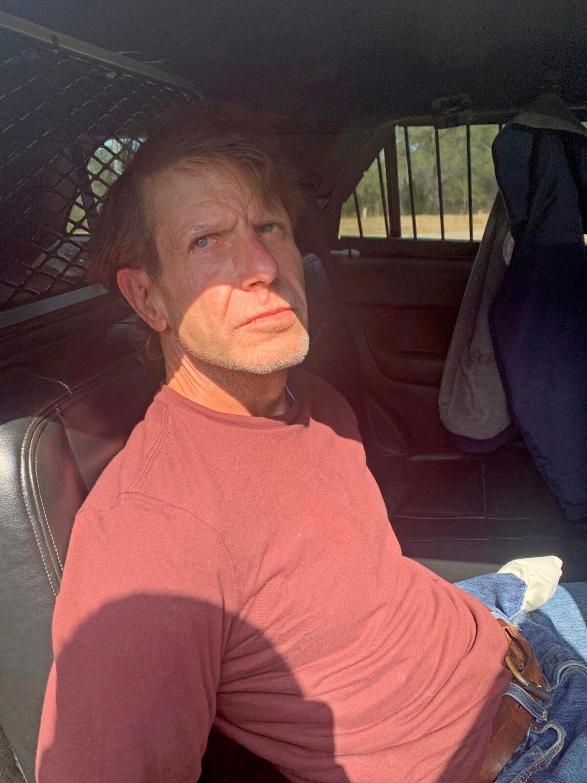 Michael Floyd Wilson, an inmate who escaped from the Central Mississippi Correctional Facility, is shown in custody in this photo provided to media outlets by the Harrison County Sheriff's Office, taken after he was captured on Feb. 15, 2022. (Harrison County Sheriff's Office via AP)
