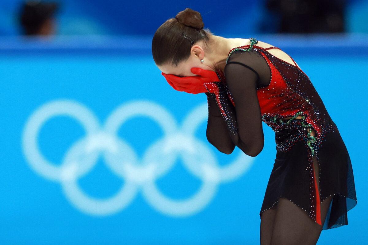Kamila Valieva of the Russian Olympic Committee reacts after her performance in the women's free skating program during the figure skating competition at the 2022 Winter Olympic Games in Beijing on Feb. 17, 2022. (Eloisa Lopez/Reuters)