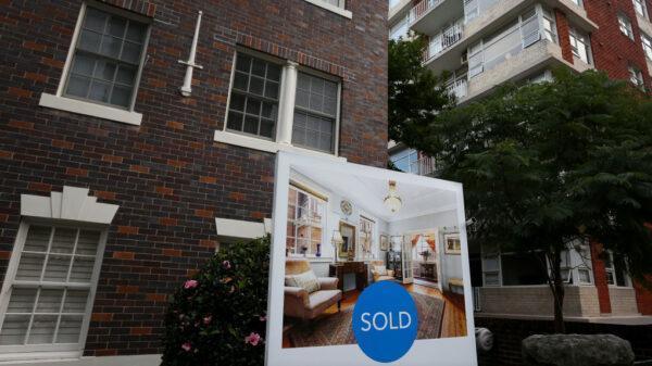 A 'sold' real estate sign is seen outside a high-rise apartment block in the suburb Kirribilli in Sydney, Australia, on May 8, 2021. (Lisa Maree Williams/Getty Images)
