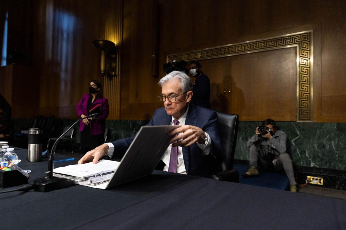 Jerome H. Powell, Chair of the Board of Governors of the Federal Reserve, prepares to leave at the end of a confirmation hearing before the Senate Banking, Housing and Urban Affairs Committee in Washington, on Jan. 11, 2022. (Graeme Jennings-Pool/Getty Images)