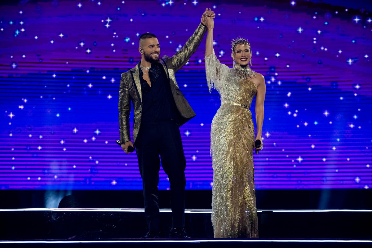 Bastian (Maluma) and Kat (Jennifer Lopez) possibly rekindling a disastrous relationship, in “Marry Me.” (Barry Wetcher/Universal Pictures)