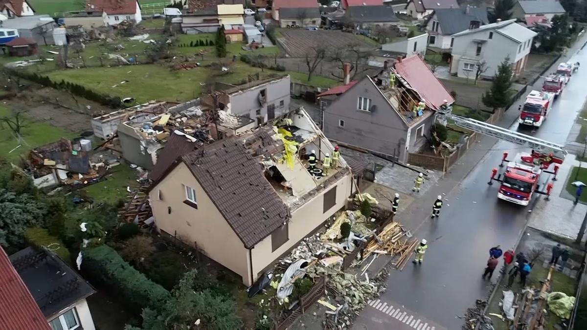 Damage to houses after strong winds in Krakow, Poland on Feb. 17, 2022, in a still from a video. (Courtesy of TVN/AP/ Screenshot via The Epoch Times)