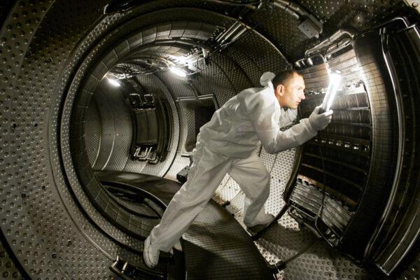 A technician checks a plasma heating system inside a chamber of a nuclear reactor in this file photo in Cadarache, France, on July 28, 2004. (Boris Horvat/AFP/Getty Images)