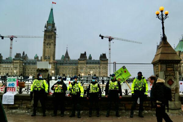 Police at the site of the protest against COVID-19 mandates by Parliament in Ottawa on Feb. 17, 2022. (Jonathan Ren/The Epoch Times)