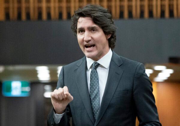 Prime Minister Justin Trudeau rises during Question Period in Ottawa on Feb. 15, 2022. (The Canadian Press/Adrian Wyld)