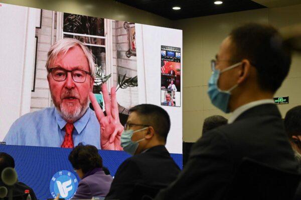 Former Australian prime minister Kevin Rudd is seen on a screen as he speaks via a live video link at the Lanting Forum on China-US relations in Beijing, China, on Feb. 22, 2021. (Greg Baker/ AFP via Getty Images)