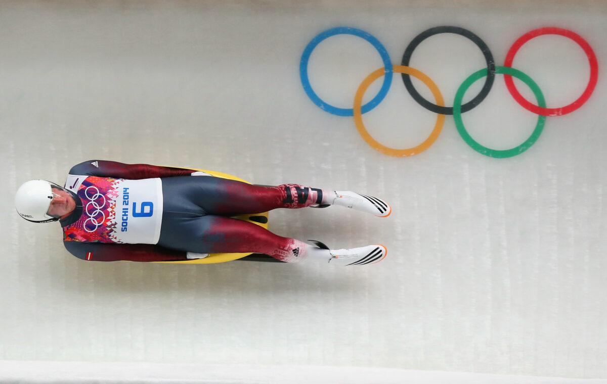 Martins Rubenis of Latvia makes a run during the Luge Men's Singles on Day 1 of the Sochi 2014 Winter Olympics at the Sliding Center Sanki on Feb. 8, 2014, in Sochi, Russia. (Alex Livesey/Getty Images)