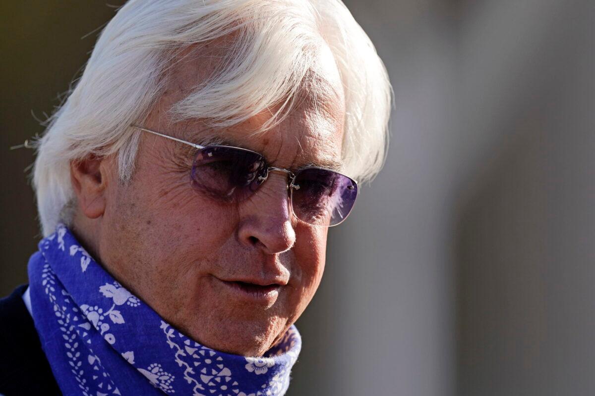 Bob Baffert, trainer for Kentucky Derby hopeful Medina Spirit, talks to a reporter outside his barn at Churchill Downs in Louisville, Ky., on April 27, 2021. (Charlie Riedel/AP Photo)
