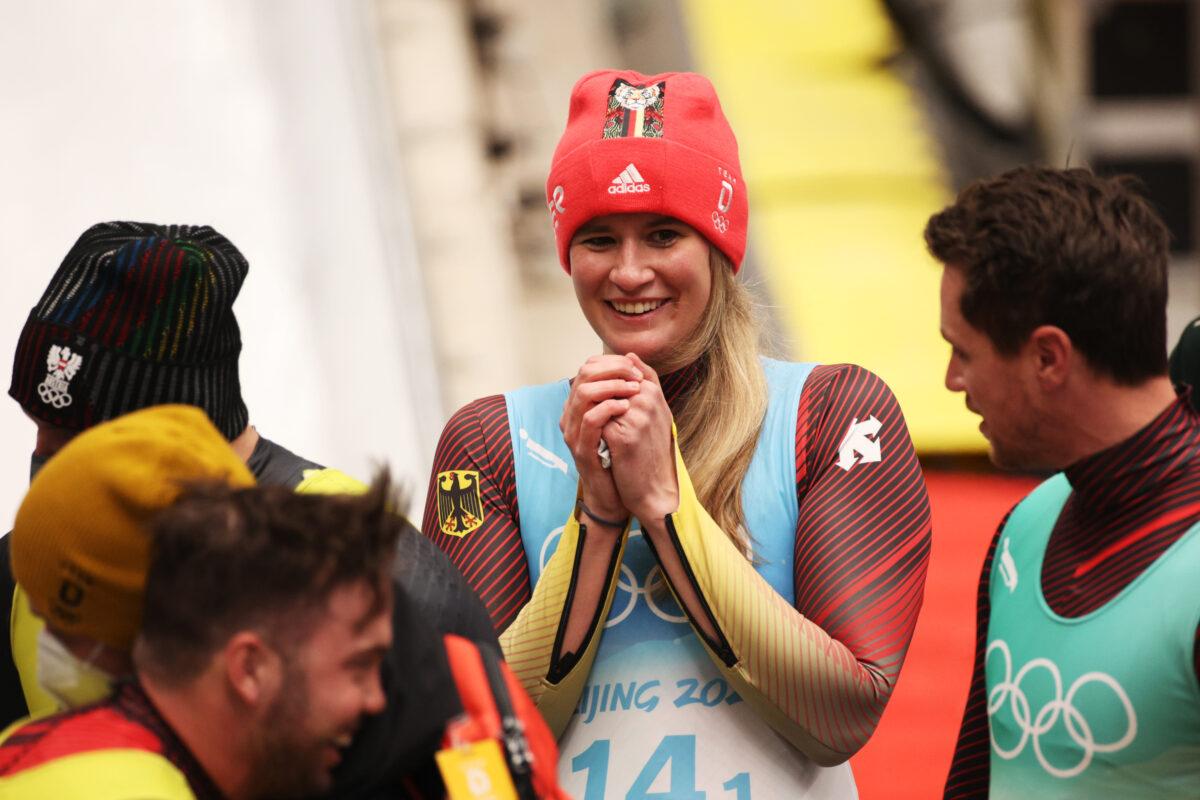 Natalie Geisenberger of Team Germany reacts after winning gold during the Luge Team Relay on day six of the Beijing 2022 Winter Olympics at National Sliding Center in Yanqing, China, on Feb. 10, 2022. (Adam Pretty/Getty Images)