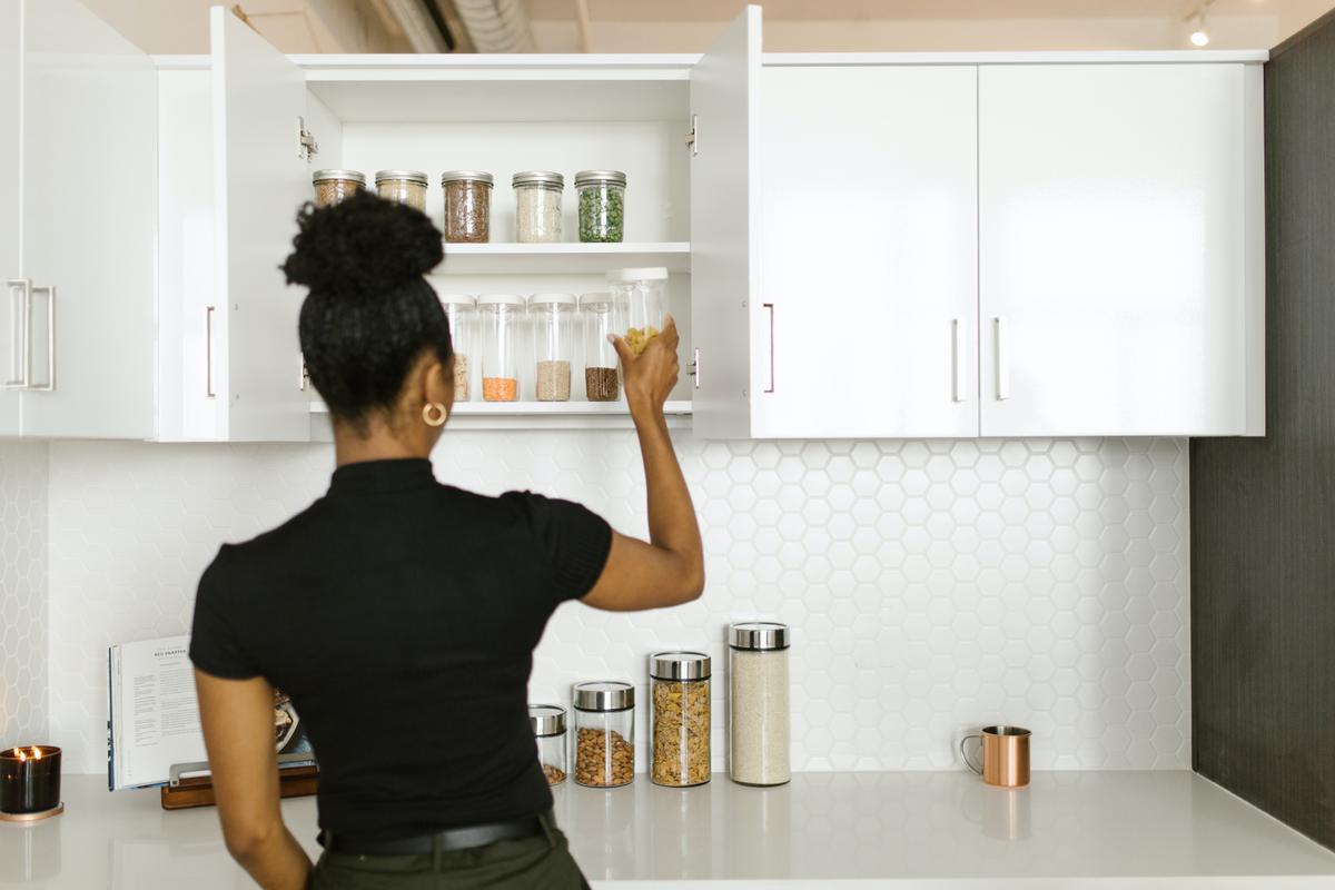 Break up large projects—such as organizing your kitchen—into smaller tasks—such as starting by cleaning out your pantry. (RODNAE Productions/Pexels)