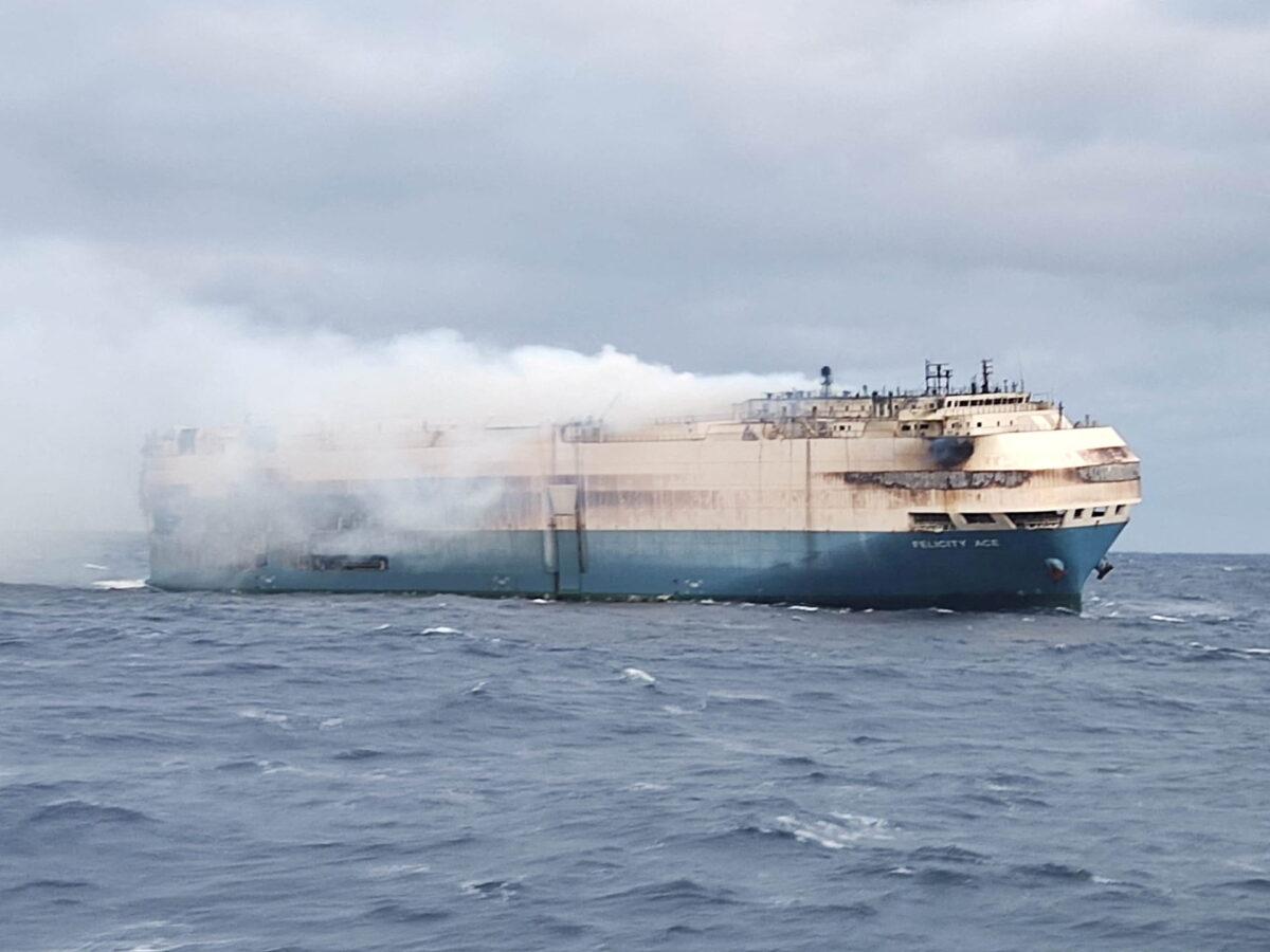 The ship, Felicity Ace, which was traveling from Emden, Germany, where Volkswagen has a factory, to Davisville, in the U.S. state of Rhode Island, burns more than 60 miles from the Azores islands, Portugal, on Feb. 18, 2022. (Portuguese Navy Marinha Portuguesa/Handout via Reuters)