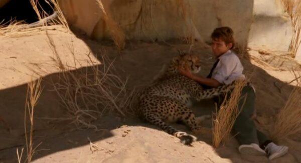 Alexander Michaletos as Xan and the cheetah in "Duma." (Warner Bros.)