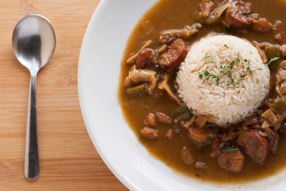 Depending on the region and the cook, gumbo may be served over a mound of rice—or potato salad. (Holly Rae Garcia/Shutterstock)