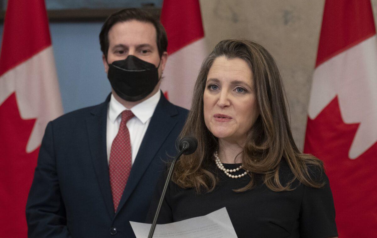 Public Safety Minister Marco Mendicino looks on as Deputy Prime Minister and Finance Minister Chrystia Freeland speaks about the implementation of the Emergencies Act in Ottawa on Feb. 17, 2022. (The Canadian Press/Adrian Wyld)