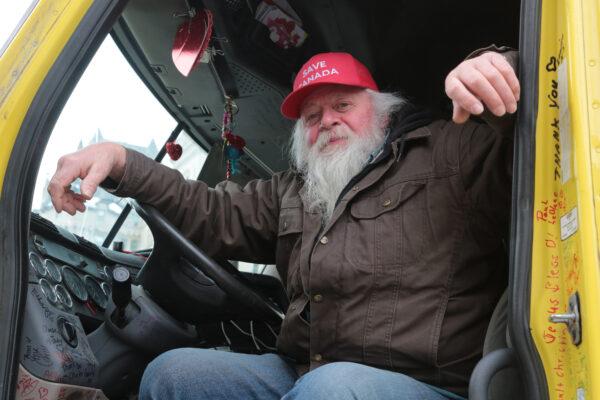 Mike Jamieson, from Windsor, Nova Scotia, in his truck at the Ottawa blockade on Feb. 16, 2022. (Richard Moore/The Epoch Times)