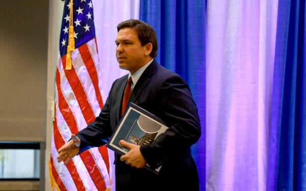 Florida Gov. Ron DeSantis leaves after holding a press conference at the Miami Dade College’s North Campus in Miami, on Jan. 26, 2022. (Joe Raedle/Getty Images)