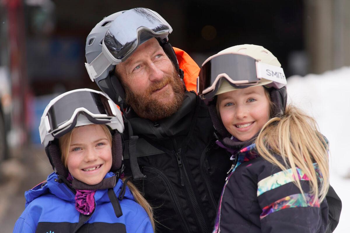  Robbie Shine and his daughters Kaia, 8 and Emery, 9, of Steamboat Springs, Colorado, are photographed at Snowbird ski resort near Salt Lake City, Utah, on Feb. 22, 2022. (Rick Bowmer/AP Photo)
