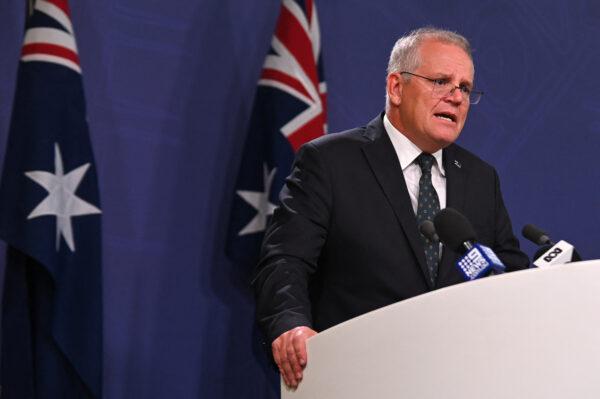 Australia's Prime Minister Scott Morrison speaks to the media to announce sanctions on top Russian officials following the invasion of eastern Ukraine during a press conference in Sydney, Australia, on Feb. 23, 2022. (Steven Saphore/AFP via Getty Images)