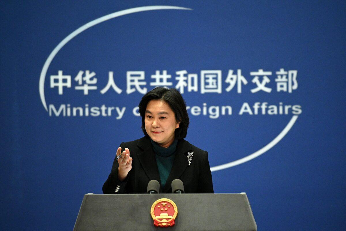Chinese foreign ministry spokesperson Hua Chunying gestures during the daily Press conference at the Foreign Ministry in Beijing on Feb. 24, 2022. (Noel Celis/AFP via Getty Images)