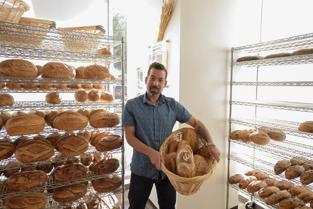 At Barrio Bread, baker Don Guerra crafts artisan loaves with locally grown heritage grains, including white Sonora wheat. (Courtesy of Visit Tucson)