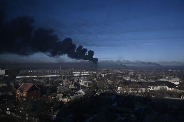 Black smoke rises from a military airport in Chuguyev near Kharkiv, Ukraine, on Feb. 24, 2022. (Aris Messinis/AFP via Getty Images)