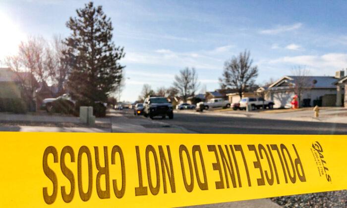 New Mexico Officer Wounded, 1 Suspect Dead, 2nd at Large