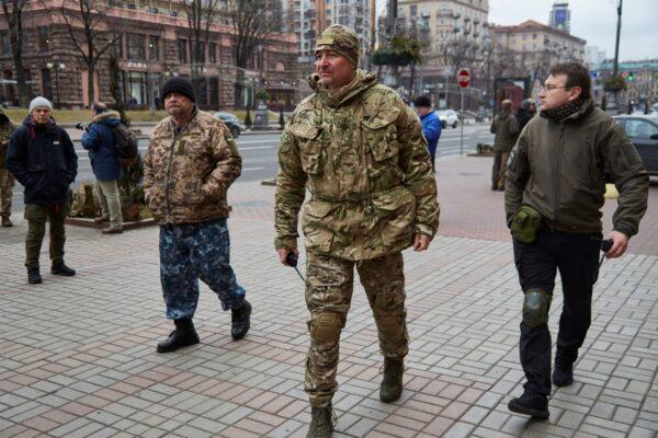 Right Sector militias gather outside the city hall prior to deploying on defensive positions in Kyiv, Ukraine, on Feb. 24, 2022. (Pierre Crom/Getty Images)