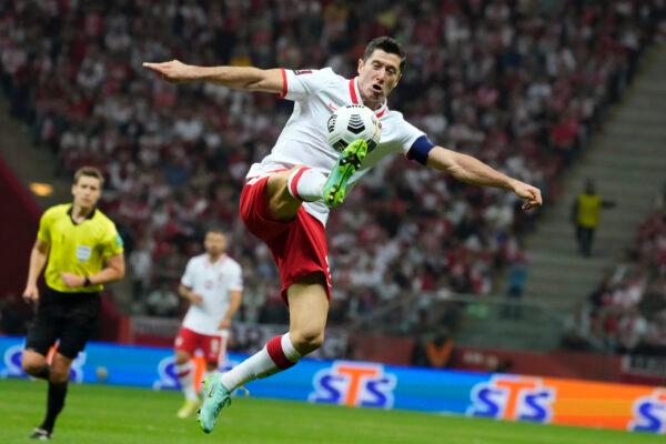 Poland's Robert Lewandowski controls the ball during the World Cup 2022 group I qualifying soccer match between Poland and England, at the Narodowy stadium in Warsaw, Sept. 8, 2021. (Czarek Sokolowski, File/AP Photo)