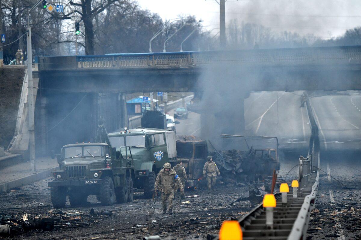 Ukrainian service members in Kyiv, Ukraine on Feb. 26, 2022. (Sergei Supinsky/AFP via Getty Images)
