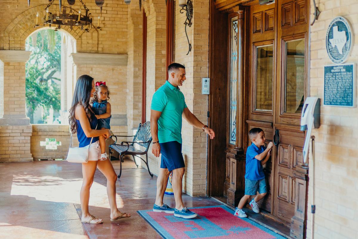 A family at the entrance to the Bryan Museum. (Visit Galveston)